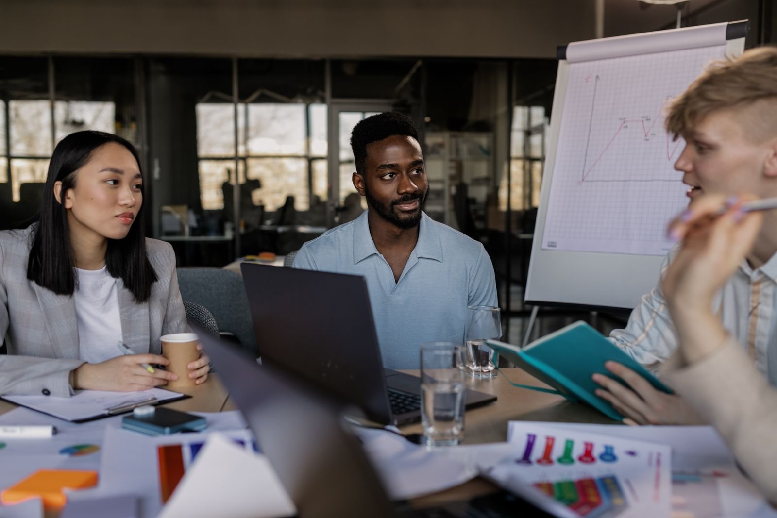 Business owner meeting an SEO agency team to discuss hiring