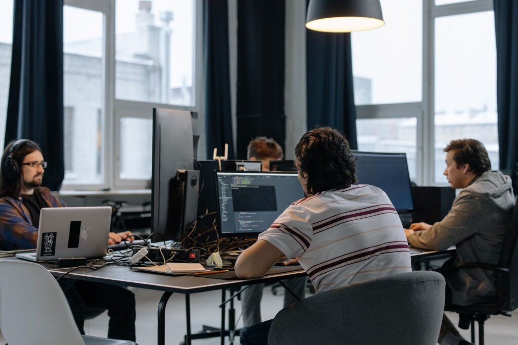 SaaS link building services guide showing a software team at work.