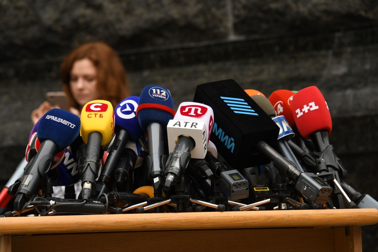 Press conference microphones set up for digital PR media coverage