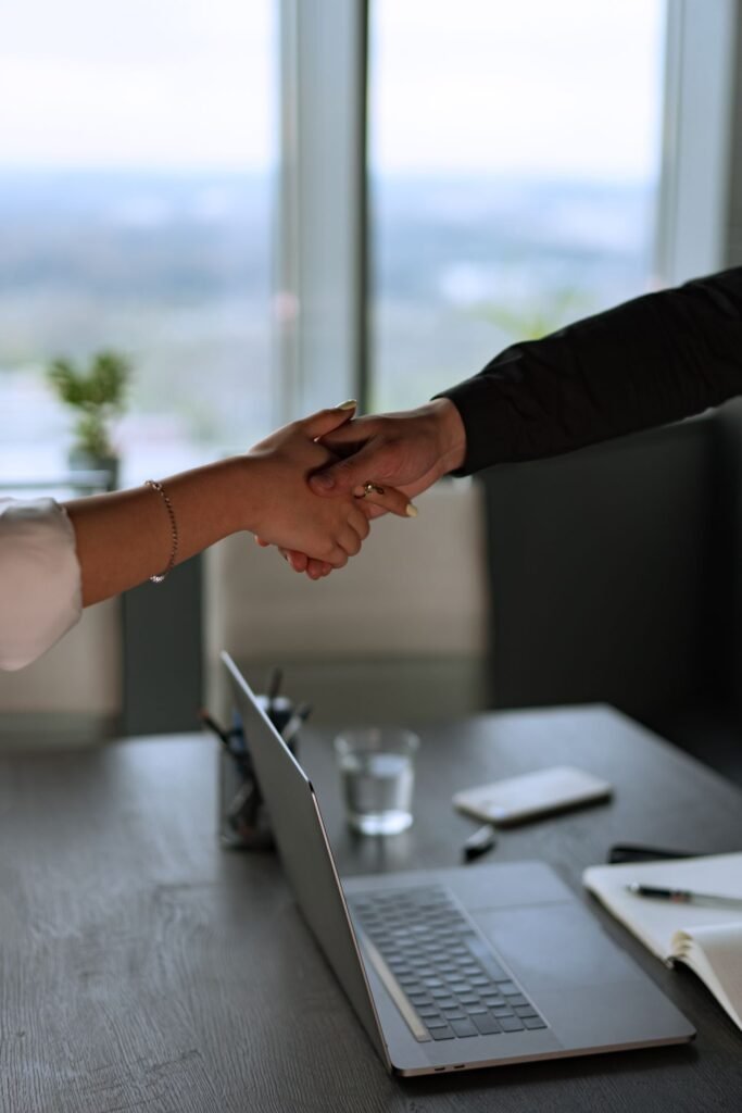 Link building services guide showing a company meeting to review a report